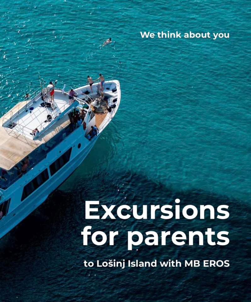 Parents excursion boat on crystal-clear Adriatic waters